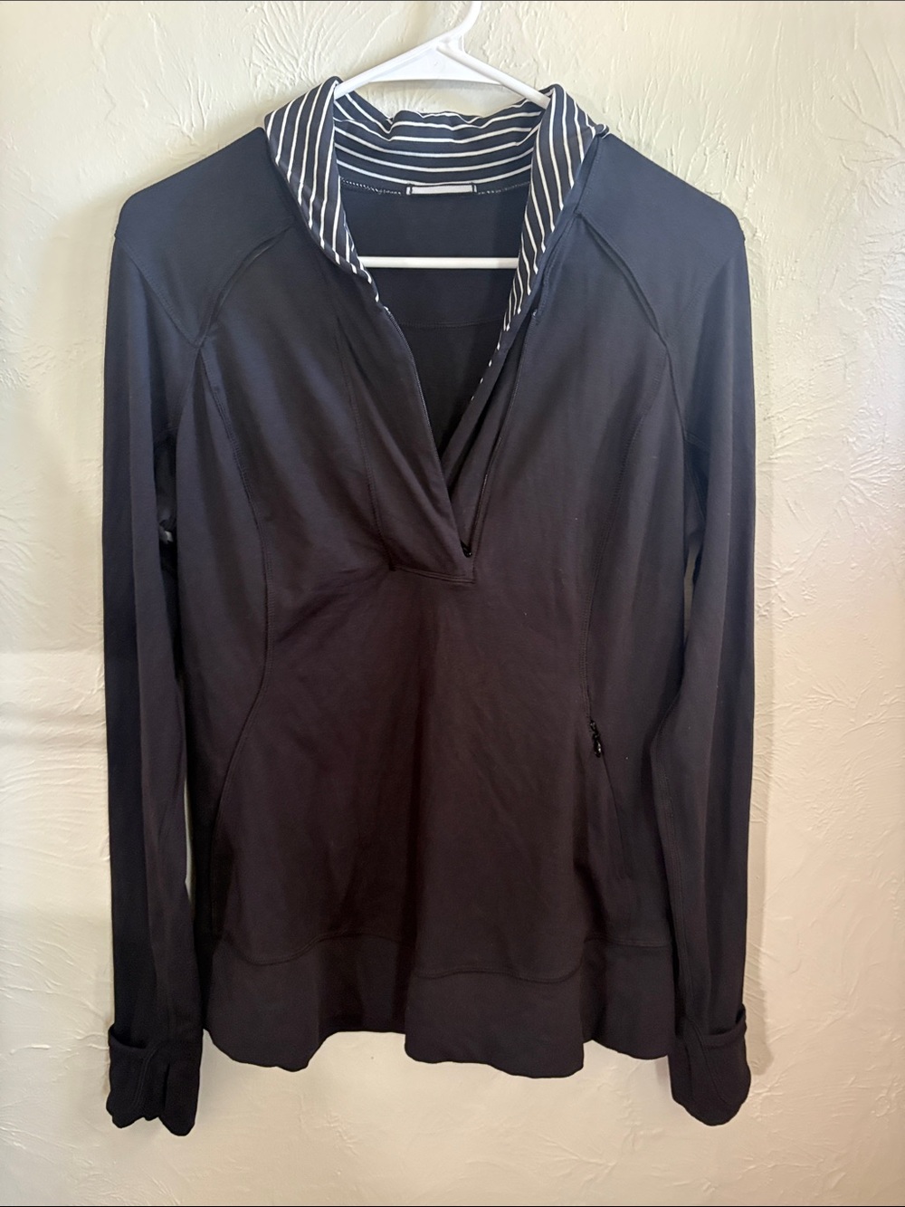 Lululemon Think Fast Pullover in black with parallel strip detailing